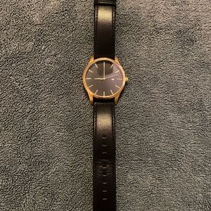 Elegant Black and Gold Watch